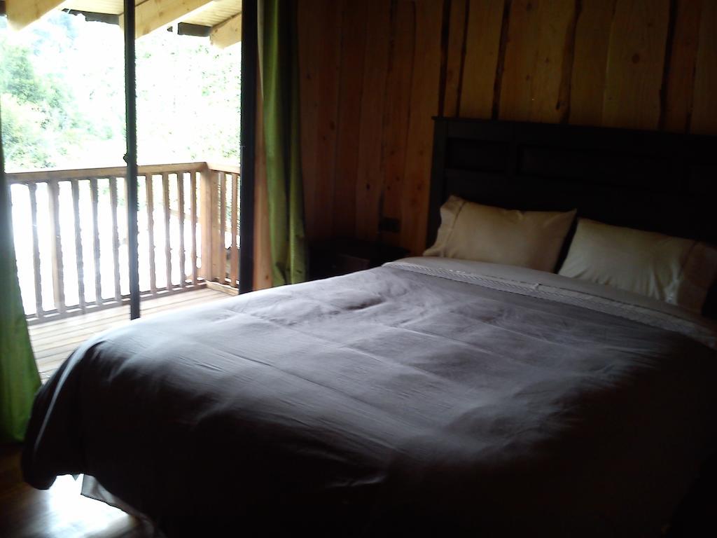 Hostal Los Alamos Neltume Zimmer foto